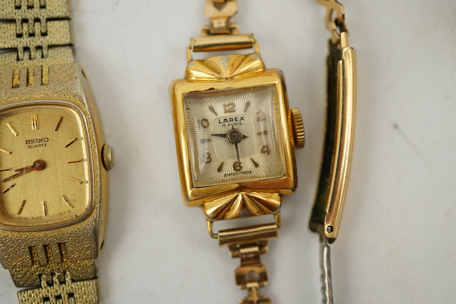 XX REMOVE ROLEX XX, A collection of watches and a bangle, comprising: two Seiko quartz watches; a manual winding watch by Larex; a quartz watch by Eterna; a quartz watch by Rotary; and a quartz watch by Pulsar; together